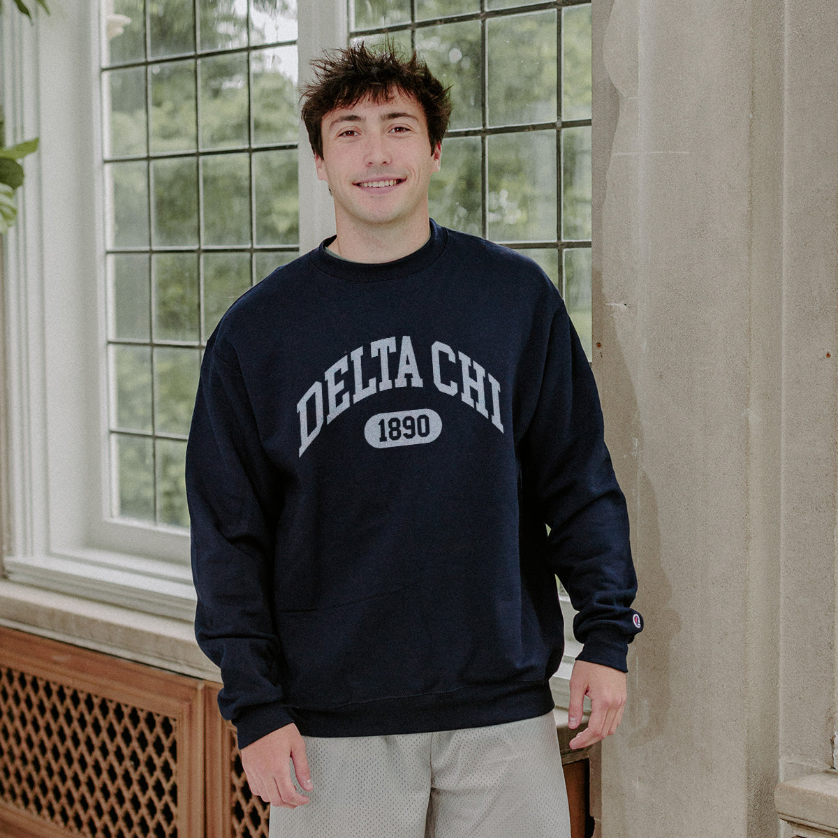 Delta Chi Navy Greek Champion Collegiate Crewneck