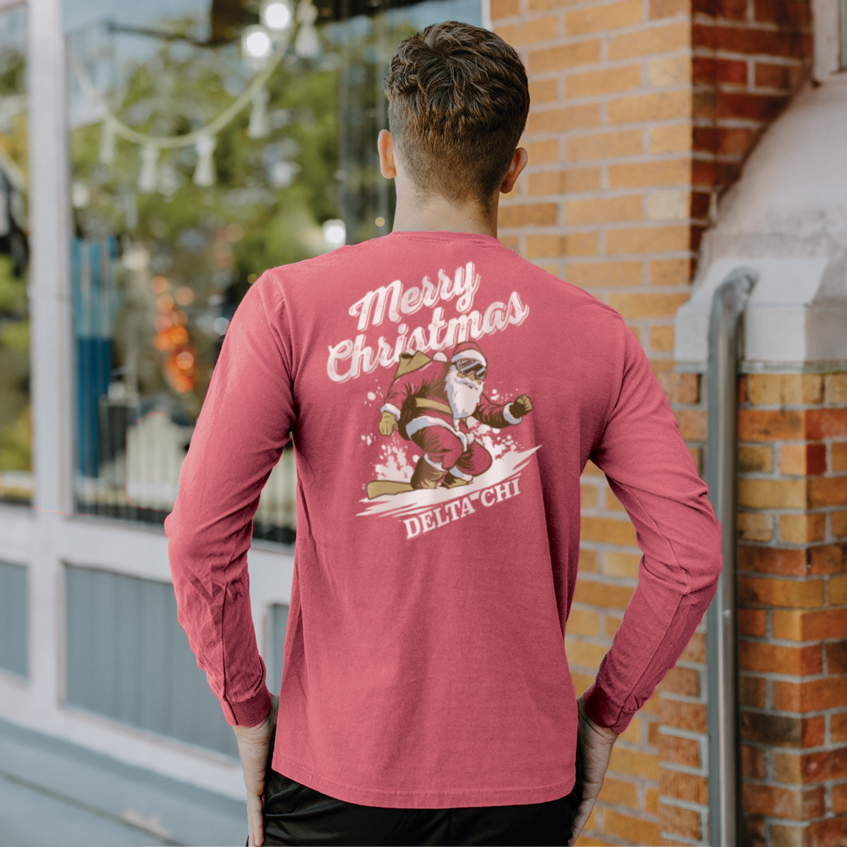 Delta Chi Holiday Shredding Santa Long Sleeve Tee