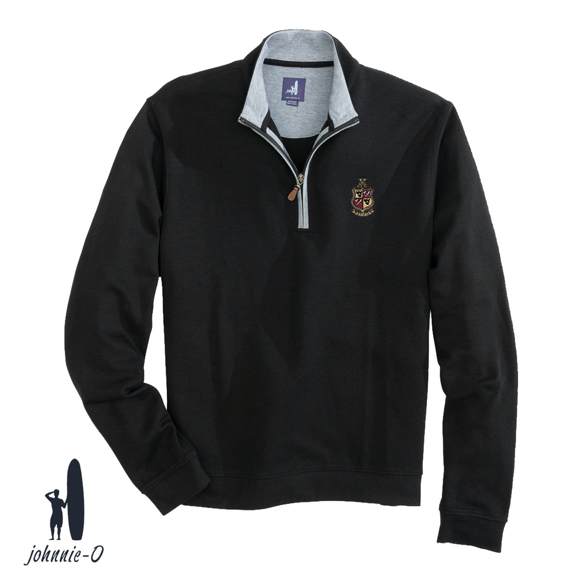 A black johnnie-O quarter-zip pullover with a gray collar and leather zipper pull, featuring an embroidered fraternity crest on the left chest. Displayed on a white background with the johnnie-O logo in the bottom corner.