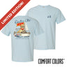 Light blue Comfort Colors t-shirt shown front and back; front features small Greek letters on the left chest, back displays a golden retriever sailing a boat with script text above and “Chasing Open Water” below.